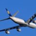 Lufthansa Airbus A340-600 D-AIHU climbing out of Boston