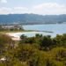 View over Montego Bay, Jamaica, with a white-sand beach, the bay and green hills