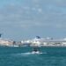 Cruise ships docked at the Port of Miami, seen across the water